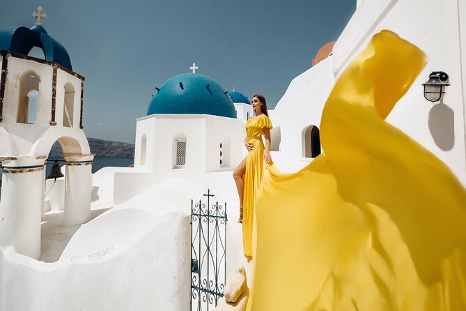 1-Hour Private Santorini Flying Dress Photoshoot - Pickup, meeting point, and walking demands