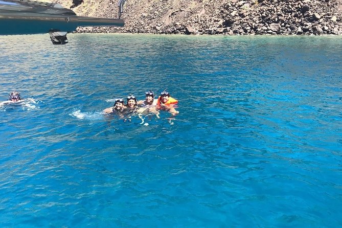 ALL-INCLUSIVE: Santorini Caldera Cruise with Greek Meal & Drinks - Red Beach and Mesa Pigadia from the catamaran