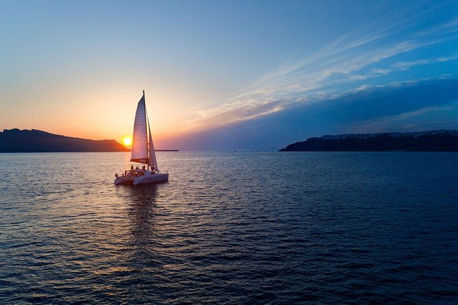 Caldera Cruise with Swim Stops, BBQ on board and drinks! - Sunset departures and the best timing