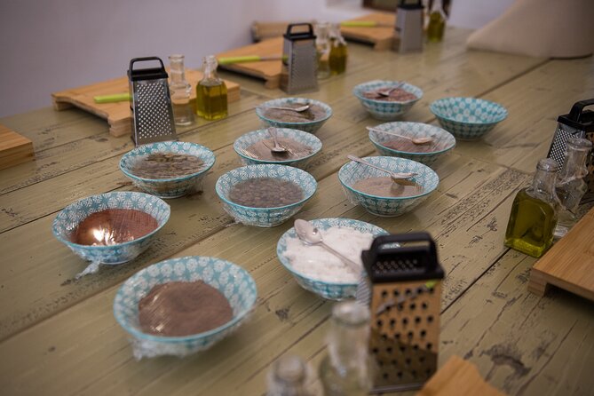 Cooking Class in Traditional cave house in Santorini! - Assyrtiko, lunch, and the social side