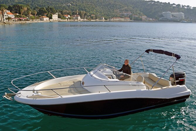 Explore Santorini and its volcanic wonders with Alex Private Boat - Nea Kameni and the sulfur-water swim