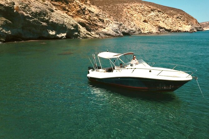 Explore Santorini and its volcanic wonders with Alex Private Boat - Greek food, wine, and music between swims