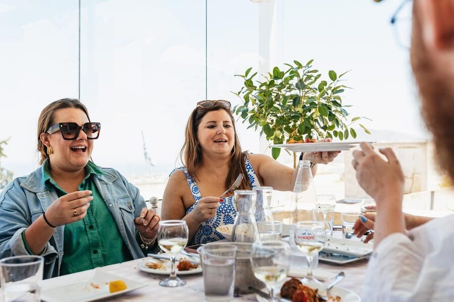Fira: Guided Foodie Walking Tour with Tastings - The caldera path and views toward the volcano