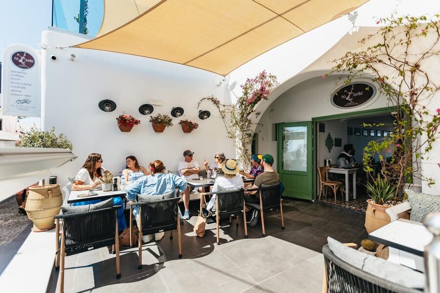 Fira: Guided Foodie Walking Tour with Tastings - What the guides add to the day