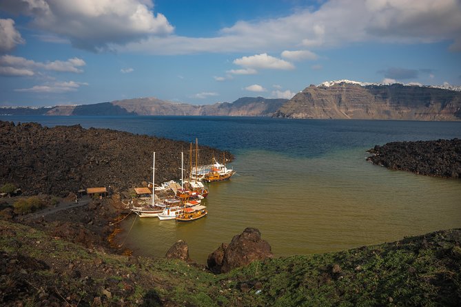 Full Day Santorini Caldera Cruise - Sailing beneath Oia on the return route