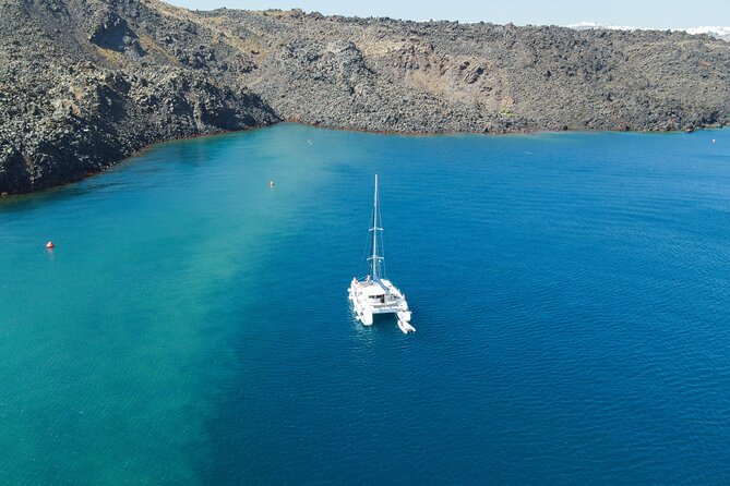 Full Day Santorini Catamaran Private Cruise with meal and transfer - Thirassia and Aspronisi complete the caldera picture