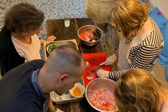 Greek Cuisine Cooking Class in Santorini with Recipes and Wine - Chef Christos brings the humor and the rules
