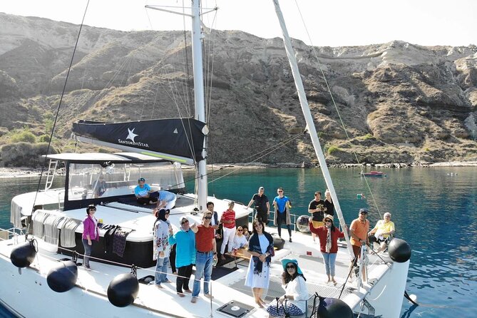 Half-Day Exclusive Catamaran Cruise in Santorini with Meal and Open Bar - Should you choose the sunset departure?