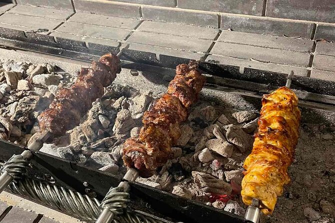 Half-Day Traditional Micro Restaurant in Santorini - What makes the hosts part of the experience