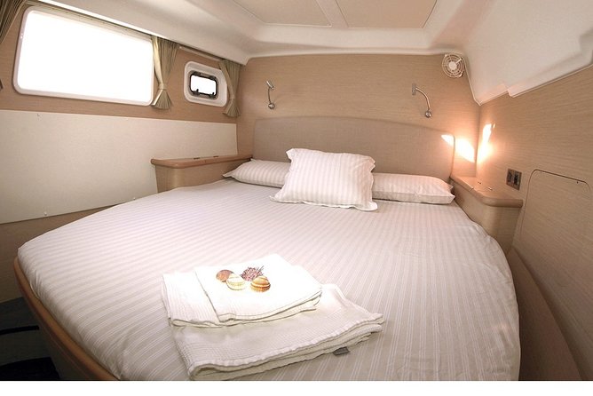 Island Hopping: Santorini Catamaran Charter Cruise with a skipper - Life aboard: cabins, bathrooms, and the daily rhythm