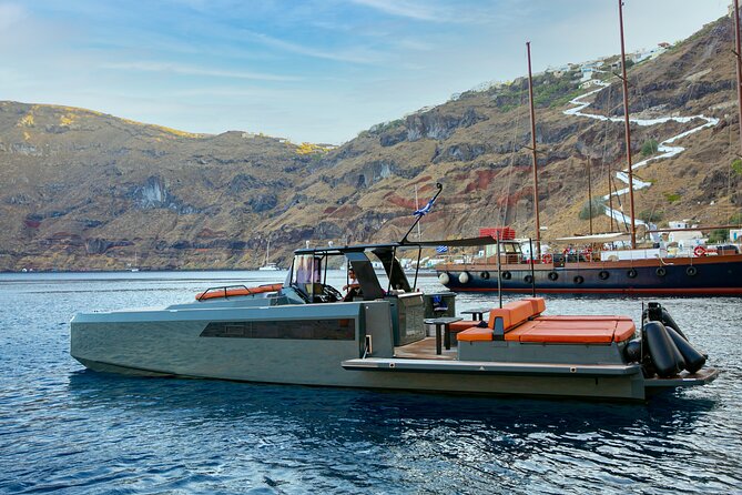 Luxury Private Power Catamaran Tour in Santorini - Thirassia gives the cruise a quieter change of pace