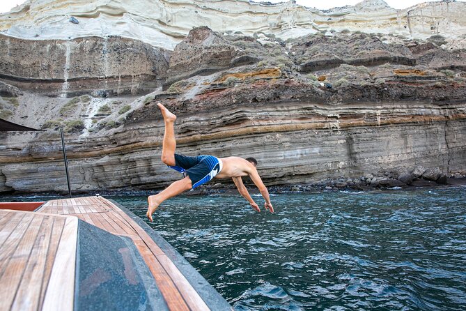 Luxury Private Power Catamaran Tour in Santorini - Armeni Bay, caves, and the Santorini coastline