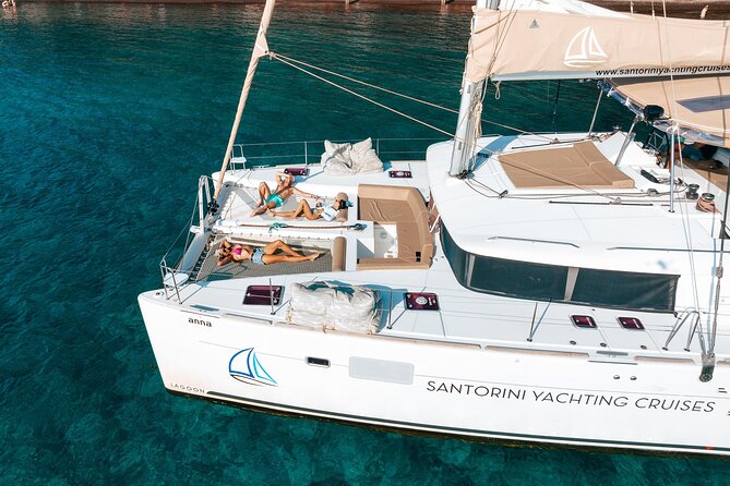 Luxury Santorini Catamaran Cruise: Lunch, BBQ, Drinks, Transfers - Key points at a glance