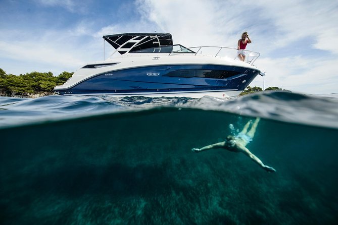 Motor Yacht (2020)Luxury Private Cruise Around Santorini - Red Beach and White Beach show Santorini’s volcanic colors