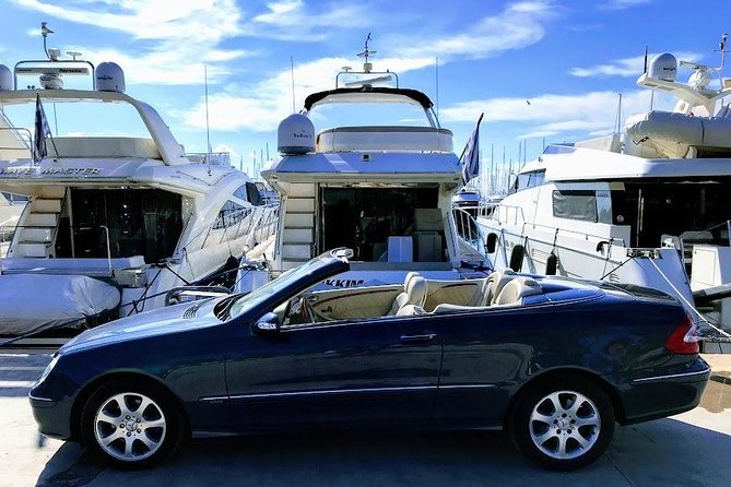 Private Cabrio 5 Hours Santorini Highlights Tour - Oia: one hour among cave houses and caldera views
