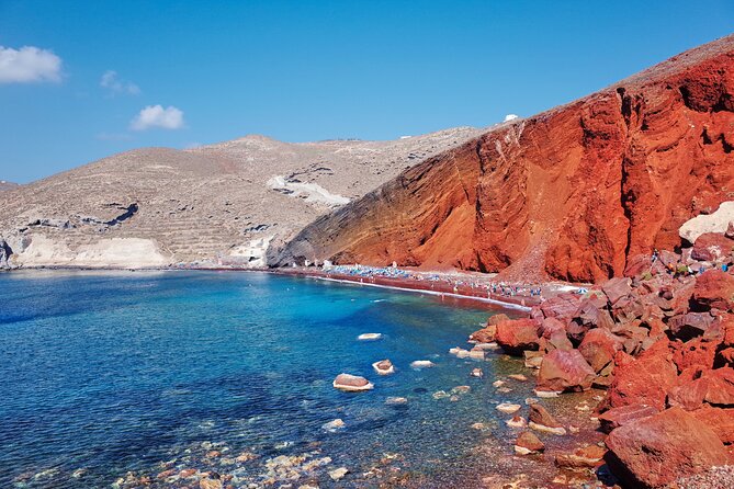 Private Guided Full Day Tour of Santorini - Perissa brings you to black volcanic sand