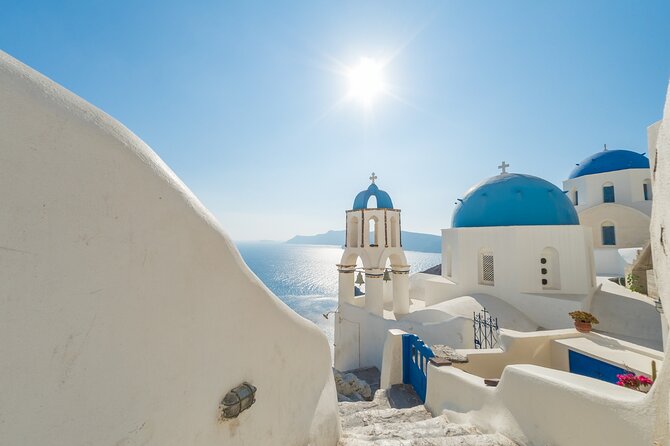 Private Half day - Best of Santorini and Wine Tasting tour - Oia: blue domes, caldera views, and shopping lanes