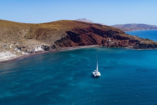 Private Luxury Caldera Cruise with a rich BBQ meal and Open Bar! - Captain John, first mate George, and the family-friendly tone