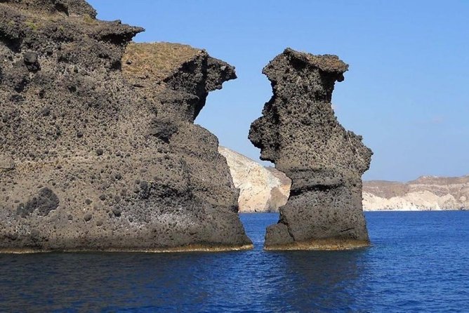 Private Luxury Santorini Catamaran Cruise with Port Pickup - Why seeing Santorini from a catamaran changes the day