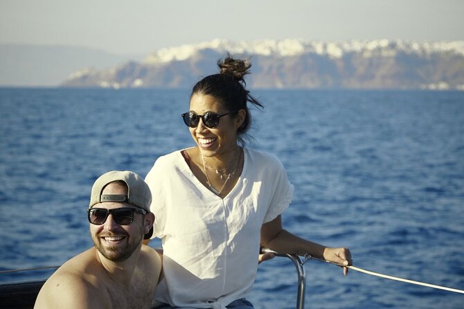 Private Luxury Santorini Catamaran Cruise with Port Pickup - Lunch near Nea Kameni, with the caldera as your dining room