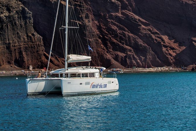 Private Morning Tour Lagoon 400-380 Sailing in Santorini ,lunch, drink, transfer - White Beach, the long swim and lunch stop