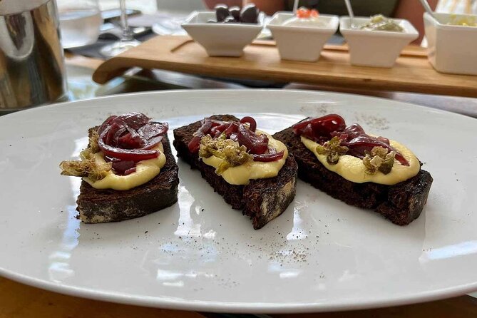 Private Santorini Wine Tour with 12 Wine Tastings and Dinner - The family cellar and old-fashioned winemaking