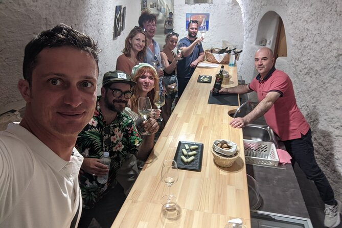 Private Santorinian Wine Tour - Venetsanos Winery, wine above the caldera