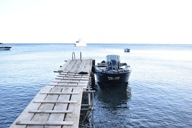 Rent a Boat in Santorini without a License - Swimming, snorkeling, and finding a quiet cove