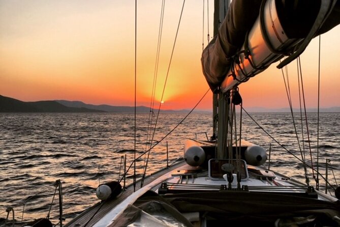 Sailsational Luxury Santorini Catamaran Sunset Cruise with Dinner - A sunset cruise built around Santorini’s volcanic coast