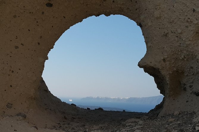 Santorini: 4hr Private Countryside Hidden Paths Tour - The lighthouse offers a quieter coastal pause