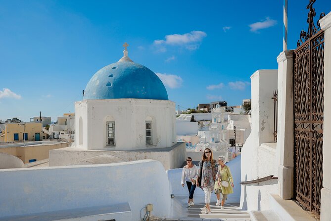 Santorini: 4hr Private First Impressions Tour - Kamari Beach brings black sand and cold Aegean water