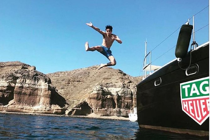 Santorini Adventurous Catamaran Experience with Snorkeling - Red Beach, Rust-Colored Cliffs and a First Swim