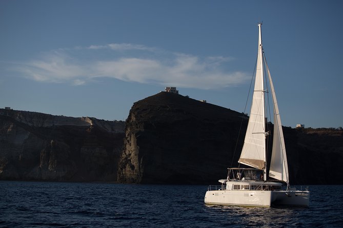 Santorini All-inclusive Catamaran Cruise with Thirassia Stop - From Amoudi Bay to the caldera
