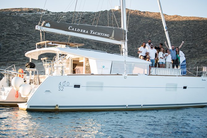 Santorini All-inclusive Private Catamaran Cruise - Red Beach: dramatic rock and a first swim