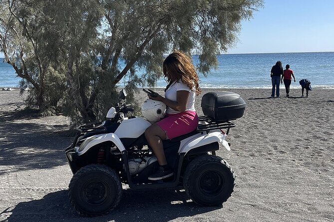 Santorini ATV Highlights Tour: Oia, Viewpoints & Volcanic Beaches - Oia, white houses and a crowded caldera town