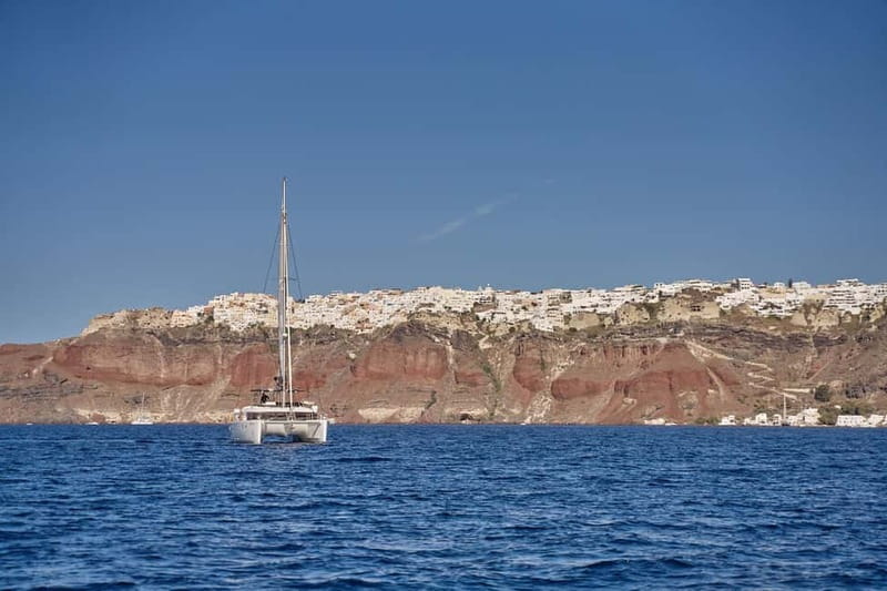 Santorini: Caldera Classic Catamaran Cruise w/ Meal & Drinks - A Greek barbecue with generous drinks