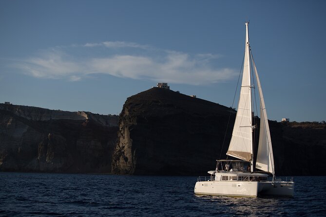 Santorini Caldera Gold Day Cruise with BBQ on board and Open Bar - Thirassia combines swimming and lunch