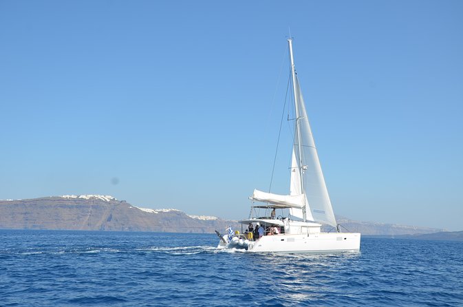 Santorini Caldera Gold Day Cruise with BBQ on board and Open Bar - Lunch, drinks, and the real value of $193.57