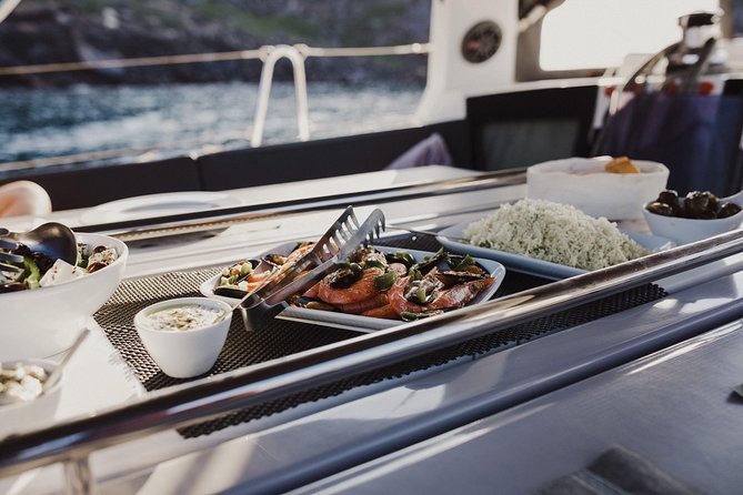 Santorini Caldera Private Sailing Boat Cruise - White Beach is reached only by boat