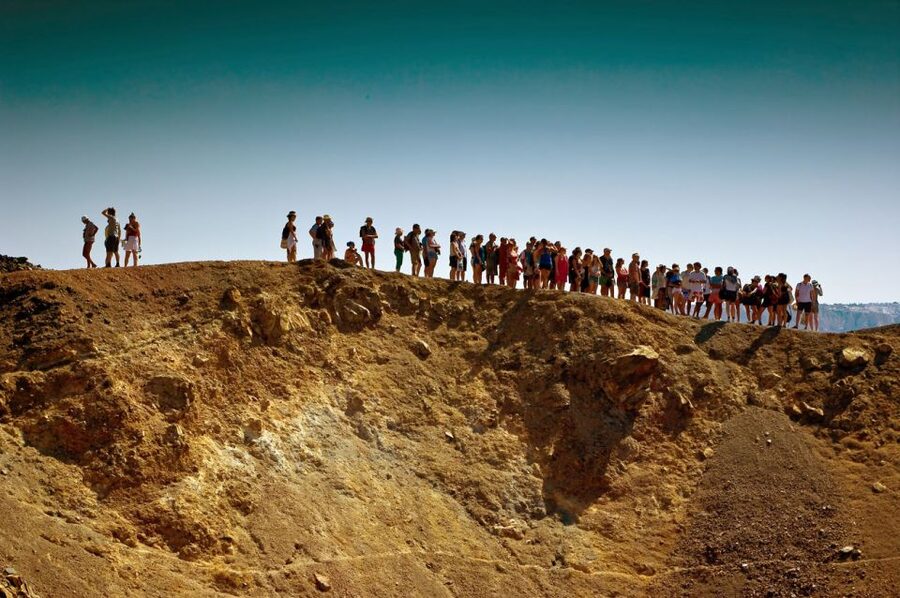 Santorini Caldera: Sunset Cruise with Dinner - Watching the sunset in Oia