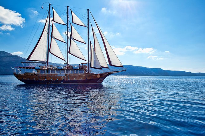 Santorini Caldera Sunset Sailing Cruise with Dinner and Wine - Greek buffet dinner near Thirassia Bay