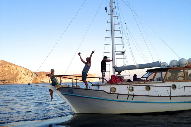 Santorini Caldera Sunset Traditional Cruise with Meal and Drinks - Starting at Ammoudi Bay and settling into the boat