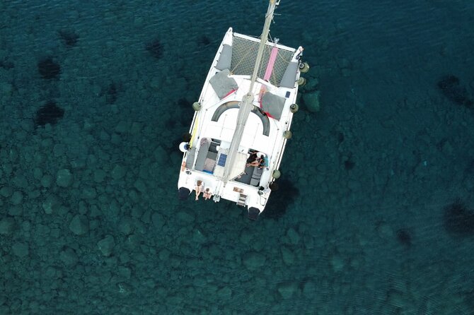 Santorini Catamaran Cruise – 5-Hour Private Sailing Experience - White Beach brings more time for snorkeling