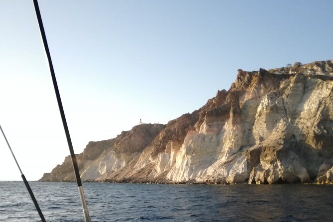 Santorini Catamaran Cruise with Fresh Meal and Open Bar - Palea Kameni and the sulfur-tinted hot springs