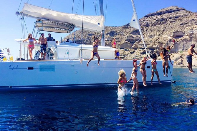 Santorini Catamaran Cruise with Fresh Meal and Open Bar - Sunset sailing and the best time to choose