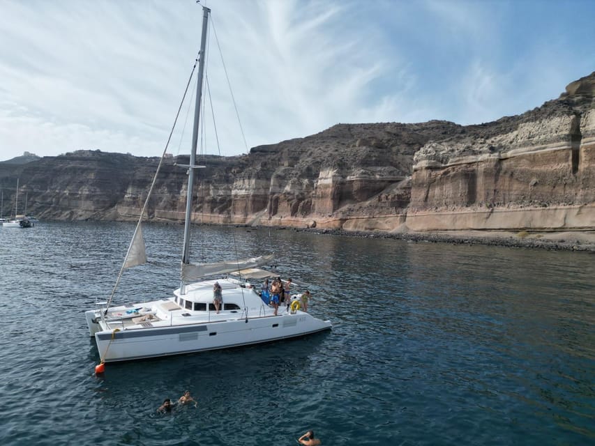 Santorini: Catamaran Cruise with Greek BBQ and Drinks - Weather, timing, and what to pack