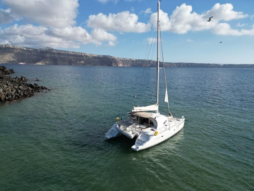 Santorini: Catamaran Cruise with Greek BBQ and Drinks - Starting at Vlychada Marina
