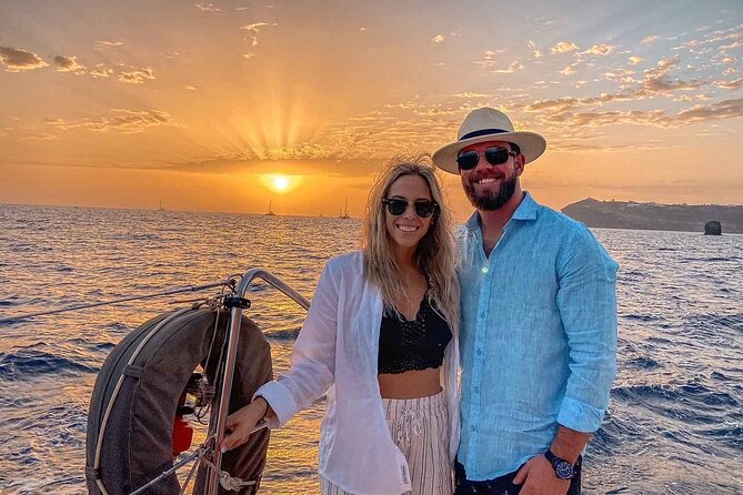 Santorini Catamaran Cruise with Greek Meal, Open-Bar and Sunset - Red Beach, White Beach, and the south coast