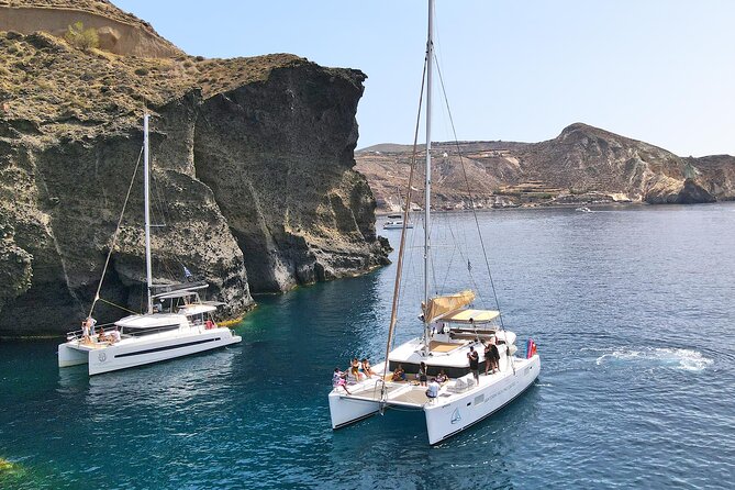 Santorini Catamaran Cruise: with Lunch, BBQ, Open Bar, Transfers - Hotel transfers remove a common Santorini hassle