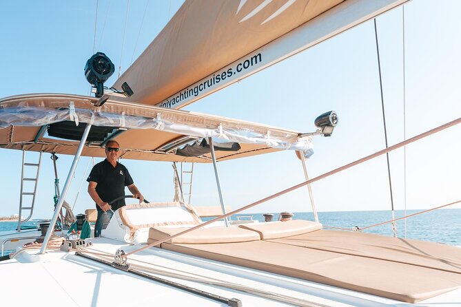 Santorini Catamaran Cruise: with Lunch, BBQ, Open Bar, Transfers - What the crew adds to the day